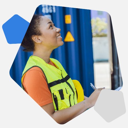 Smiling lady in vest with clipboard