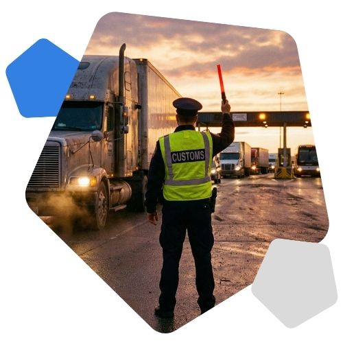 Man in customs high vis waving through lorry with baton